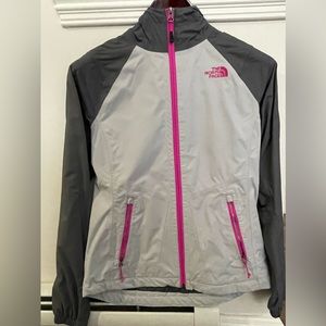 The North Face light weight waterproof jacket New without tags. Never worn